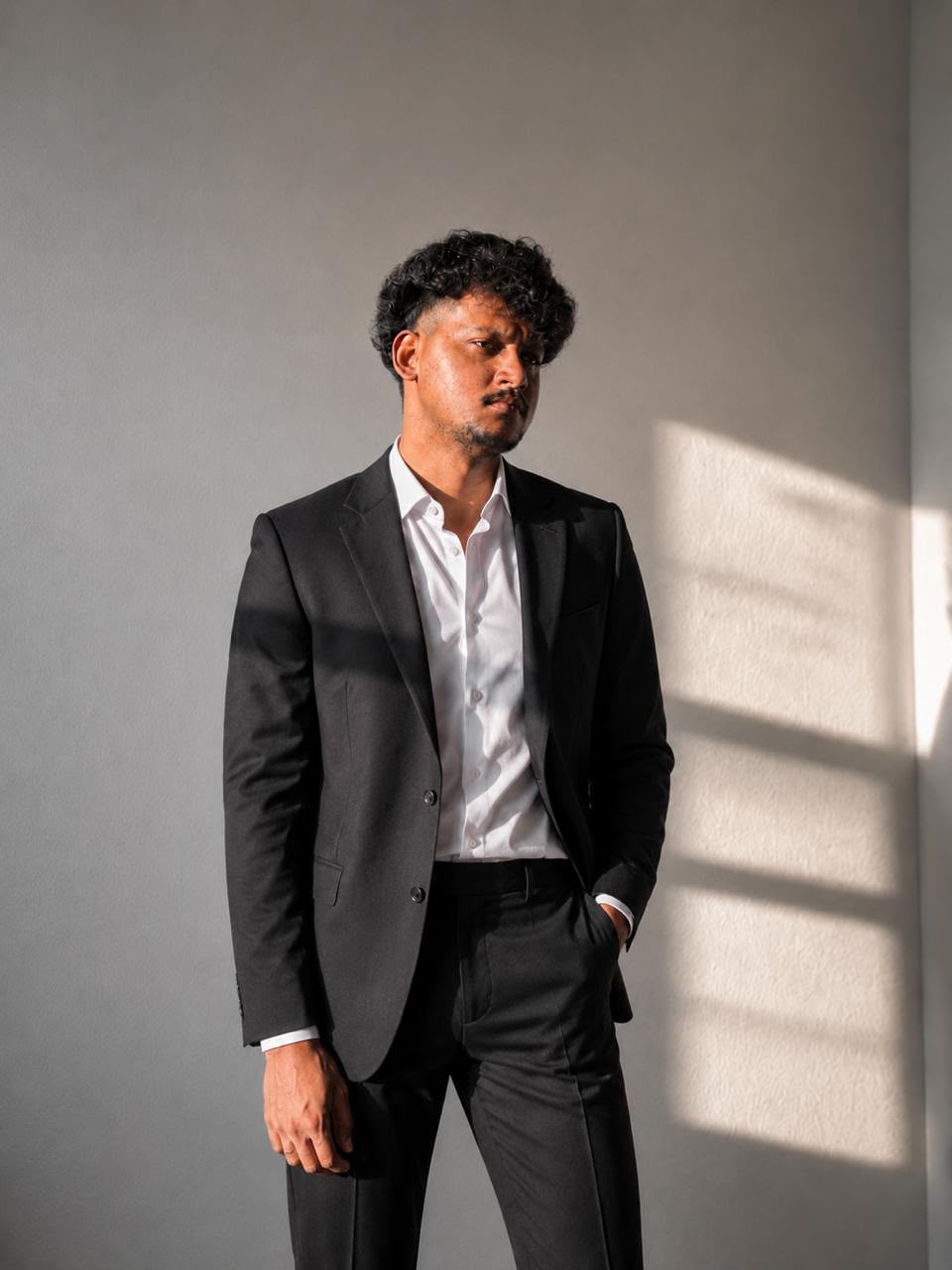 Jatin Salve in a black suit